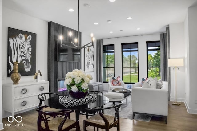 420 Monon Wy Dr, Carmel, IN 46032 - dining area featuring wood finished floors, recessed lighting, and a chandelier