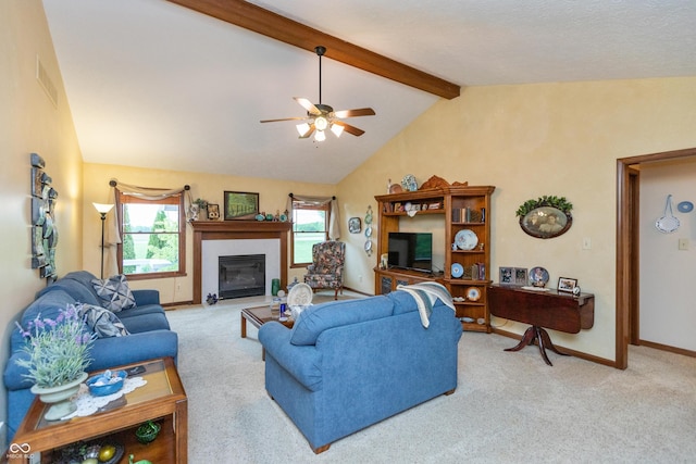 1607 Michelle Mnr, Danville, IN 46122 - carpeted living area featuring plenty of natural light, a ceiling fan, a glass covered fireplace, and baseboards