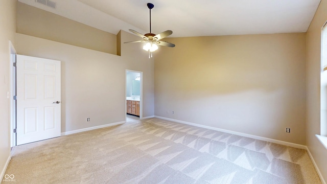 3959 Towhees Dr, Indianapolis, IN 46237 - spare room with light carpet, a ceiling fan, baseboards, and high vaulted ceiling