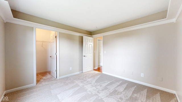 3959 Towhees Dr, Indianapolis, IN 46237 - unfurnished bedroom featuring carpet flooring, a spacious closet, baseboards, and a closet