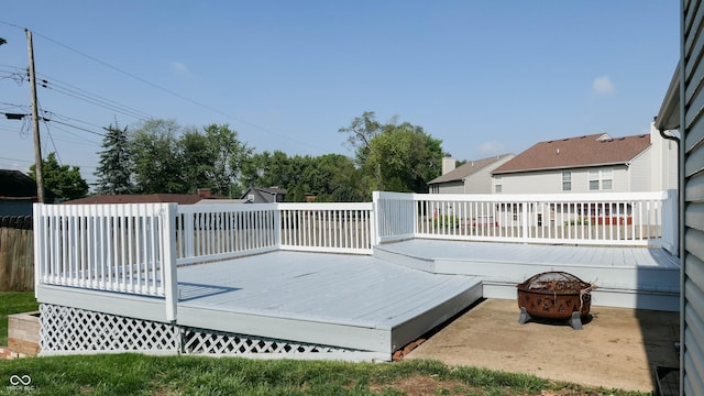 3959 Towhees Dr, Indianapolis, IN 46237 - wooden terrace with a fire pit