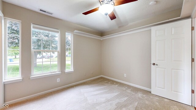 3959 Towhees Dr, Indianapolis, IN 46237 - empty room with plenty of natural light, ceiling fan, light colored carpet, and baseboards