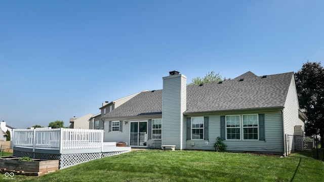 3959 Towhees Dr, Indianapolis, IN 46237 - rear view of property featuring a shingled roof, a deck, and a chimney