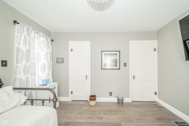 311 Northshore Blvd, Anderson, IN 46011 - bedroom featuring light wood-type flooring and baseboards