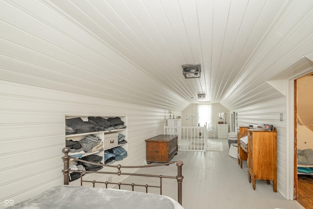 311 Northshore Blvd, Anderson, IN 46011 - bedroom with wood ceiling, lofted ceiling, wood finished floors, and wood walls