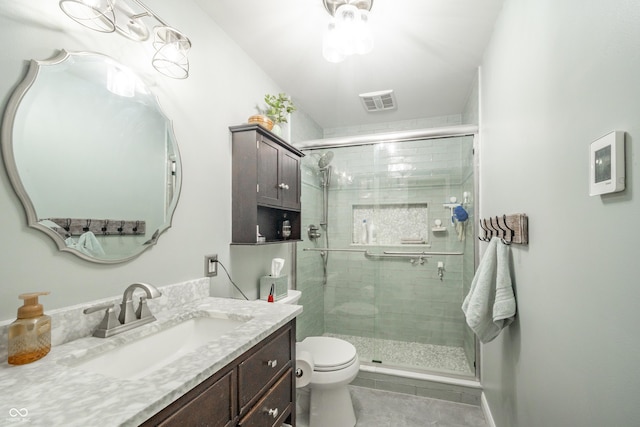 311 Northshore Blvd, Anderson, IN 46011 - full bathroom with toilet, vanity, a stall shower, and tile patterned floors
