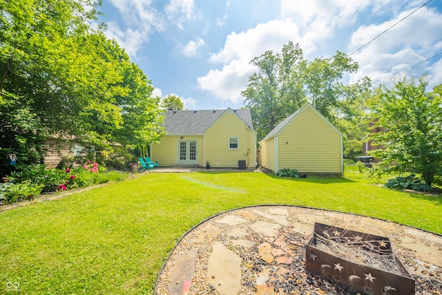 311 Northshore Blvd, Anderson, IN 46011 - rear view of house featuring french doors, a yard, and a patio