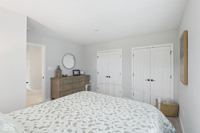 17551 Gruner Way, Westfield, IN 46062 - carpeted bedroom with two closets and baseboards