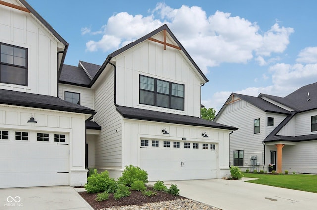 17551 Gruner Way, Westfield, IN 46062 - modern farmhouse style home with board and batten siding, driveway, and a garage
