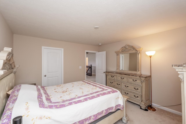 1661 Devonshire Ave, Avon, IN 46123 - bedroom featuring light carpet and baseboards