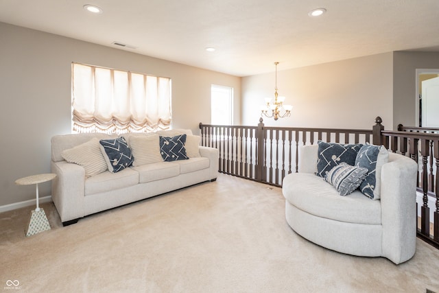 1661 Devonshire Ave, Avon, IN 46123 - carpeted living room with a chandelier, recessed lighting, and baseboards