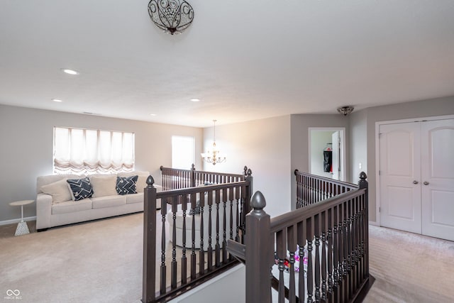 1661 Devonshire Ave, Avon, IN 46123 - corridor with an upstairs landing, carpet floors, a chandelier, recessed lighting, and baseboards
