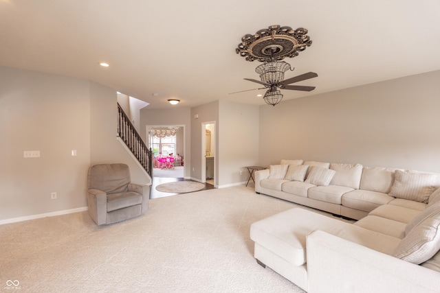 1661 Devonshire Ave, Avon, IN 46123 - carpeted living area with ceiling fan, stairway, baseboards, and recessed lighting