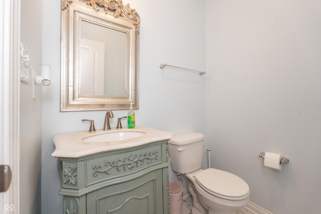 1661 Devonshire Ave, Avon, IN 46123 - half bathroom with vanity, toilet, and baseboards