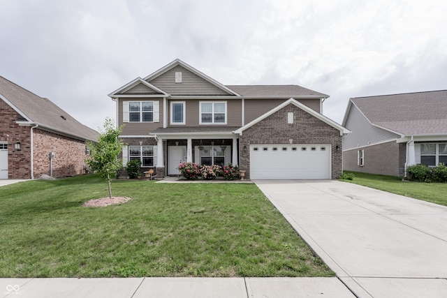 1661 Devonshire Ave, Avon, IN 46123 - craftsman house featuring concrete driveway, a front yard, an attached garage, and brick siding