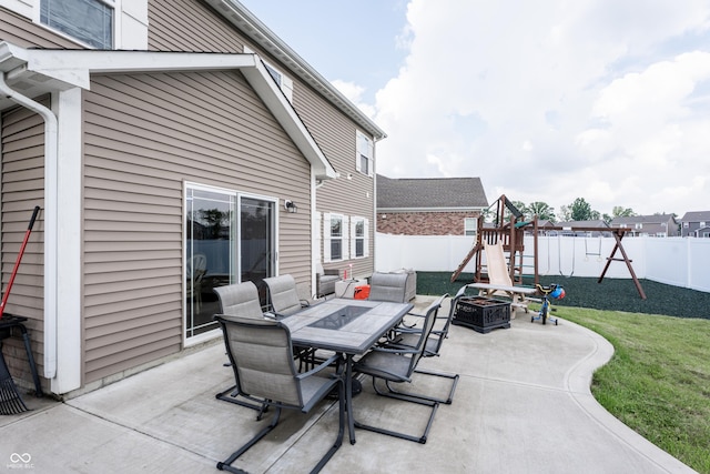 1661 Devonshire Ave, Avon, IN 46123 - view of patio / terrace featuring a playground, outdoor dining area, and a fire pit