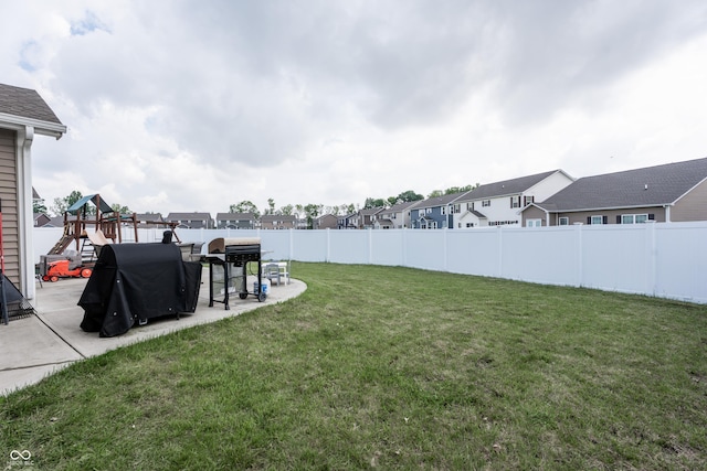 1661 Devonshire Ave, Avon, IN 46123 - view of yard featuring a patio area, a residential view, and a playground