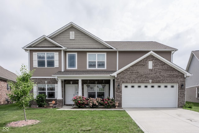 1661 Devonshire Ave, Avon, IN 46123 - view of front of home featuring brick siding, concrete driveway, a front lawn, and roof with shingles