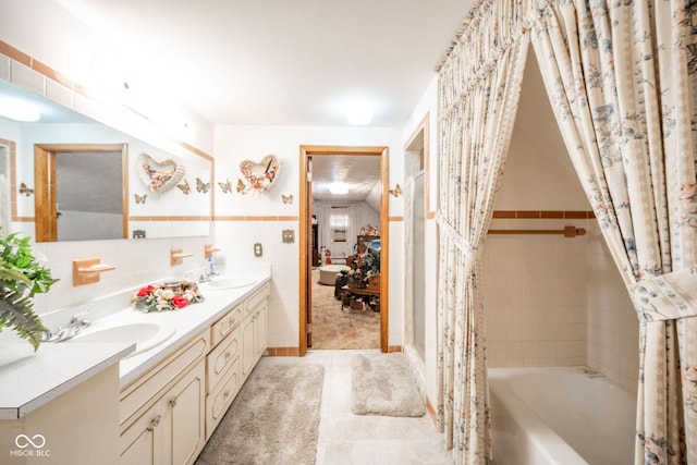 5939 Olivia Dr, Alexandria, IN 46001 - full bathroom featuring double vanity, tile walls, tile patterned floors, and shower / tub combo with curtain