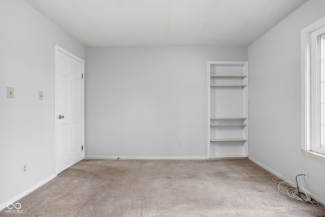 2263 Rome Dr, Indianapolis, IN 46228 - unfurnished bedroom featuring carpet flooring and baseboards