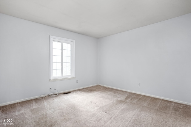 2263 Rome Dr, Indianapolis, IN 46228 - carpeted empty room featuring baseboards
