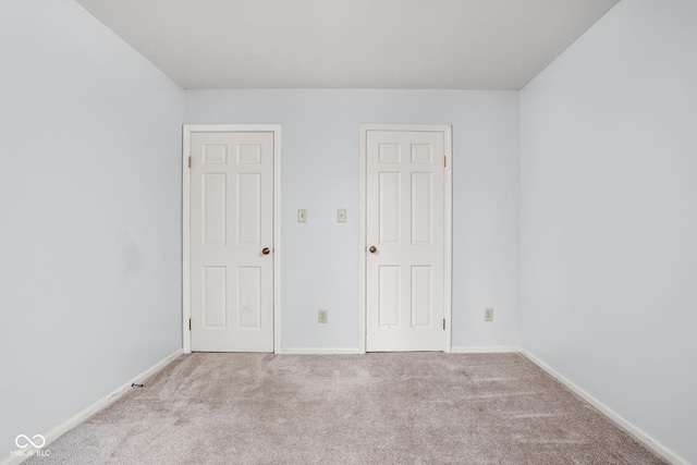2263 Rome Dr, Indianapolis, IN 46228 - unfurnished bedroom with carpet floors and baseboards