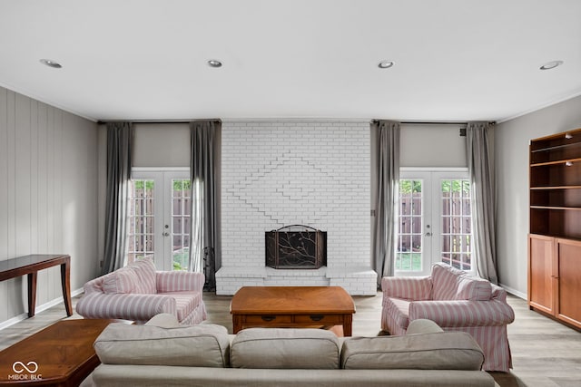 2263 Rome Dr, Indianapolis, IN 46228 - living room featuring french doors, light wood-type flooring, ornamental molding, plenty of natural light, and recessed lighting