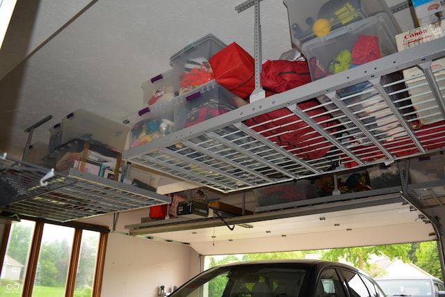 6862 Riverside Way, Fishers, IN 46038 - garage featuring a garage door opener