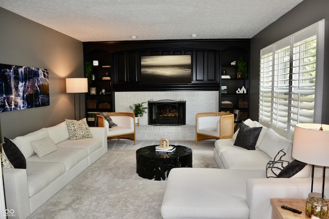 6862 Riverside Way, Fishers, IN 46038 - carpeted living area with a textured ceiling and a fireplace