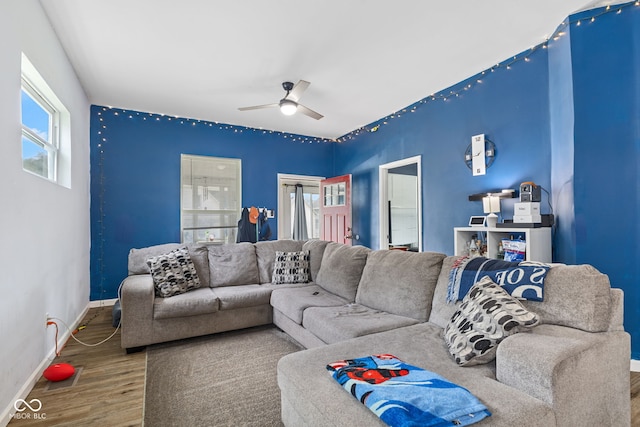 938 N Tuxedo St, Indianapolis, IN 46201 - living room with wood finished floors, ceiling fan, and baseboards