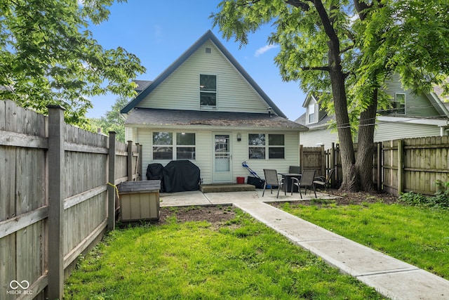 938 N Tuxedo St, Indianapolis, IN 46201 - rear view of property featuring a patio area