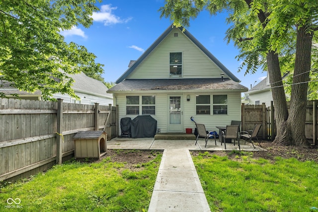 938 N Tuxedo St, Indianapolis, IN 46201 - rear view of house featuring a patio