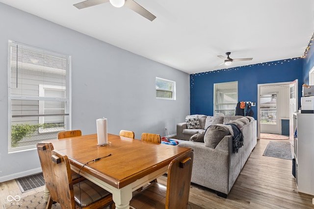 938 N Tuxedo St, Indianapolis, IN 46201 - dining room with a ceiling fan, light wood-type flooring, and baseboards