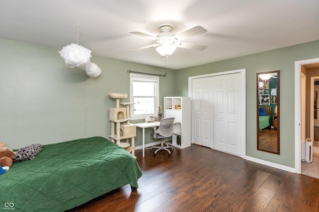 3713 Coventry Way, Carmel, IN 46033 - bedroom featuring wood-type flooring, a closet, an office area, ceiling fan, and baseboards