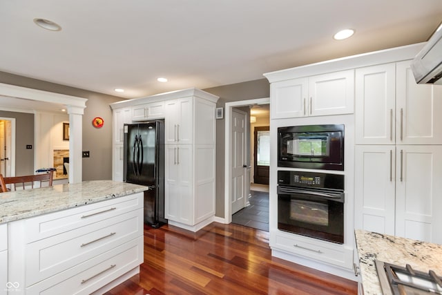 3713 Coventry Way, Carmel, IN 46033 - kitchen featuring black appliances, white cabinetry, dark wood-style floors, recessed lighting, and light stone countertops