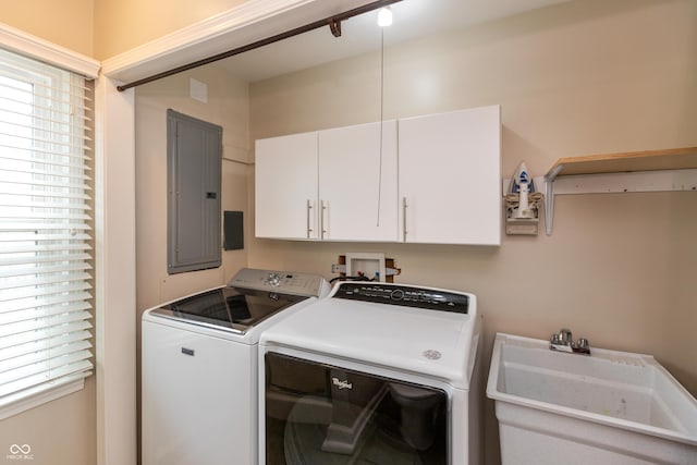 3713 Coventry Way, Carmel, IN 46033 - washroom featuring electric panel, washing machine and clothes dryer, and cabinet space