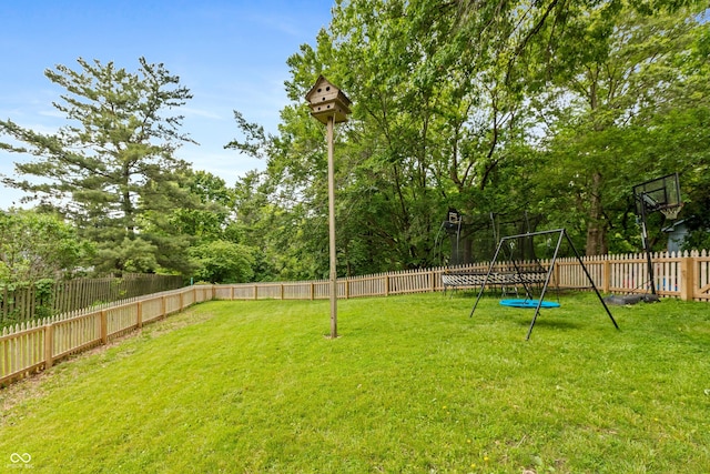 3713 Coventry Way, Carmel, IN 46033 - view of yard featuring a trampoline