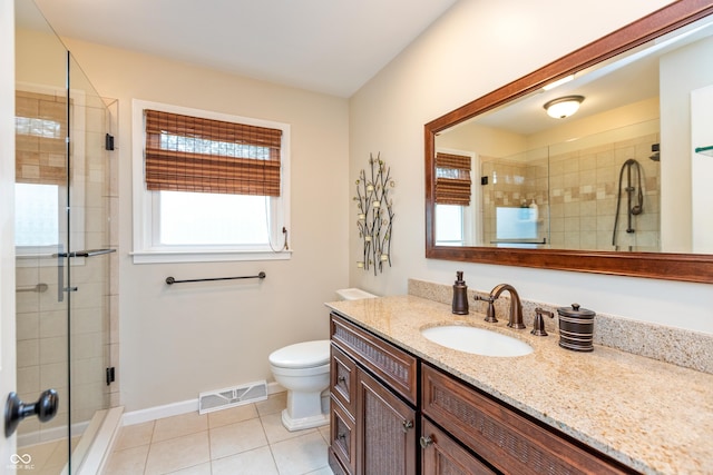 3713 Coventry Way, Carmel, IN 46033 - bathroom with vanity, a stall shower, tile patterned floors, toilet, and baseboards