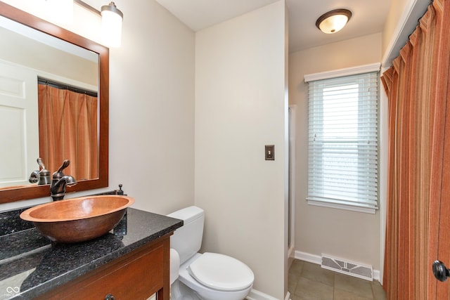 3713 Coventry Way, Carmel, IN 46033 - bathroom featuring vanity, toilet, tile patterned flooring, curtained shower, and baseboards