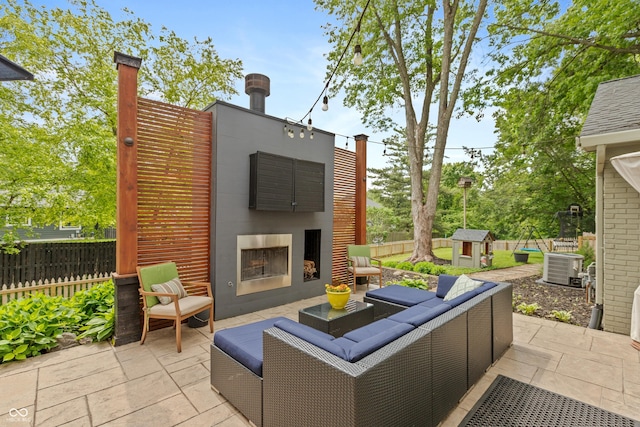 3713 Coventry Way, Carmel, IN 46033 - view of patio featuring an outdoor living space with a fireplace and central AC
