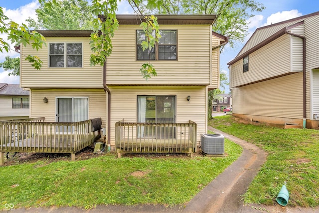 517 E Graham Pl, Bloomington, IN 47401 - view of front of house featuring central AC unit, a deck, and a front lawn