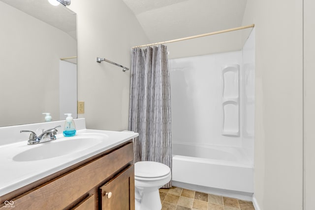517 E Graham Pl, Bloomington, IN 47401 - bathroom featuring vanity, toilet, shower / bath combo, and vaulted ceiling