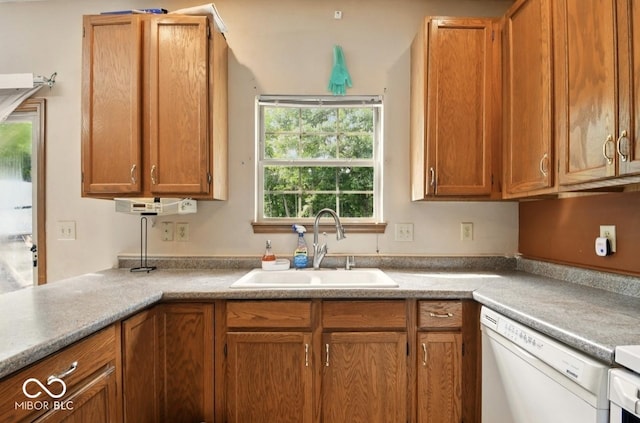 6396 Granny Smith Ln, Avon, IN 46123 - kitchen with dishwasher, a sink, light countertops, and brown cabinetry