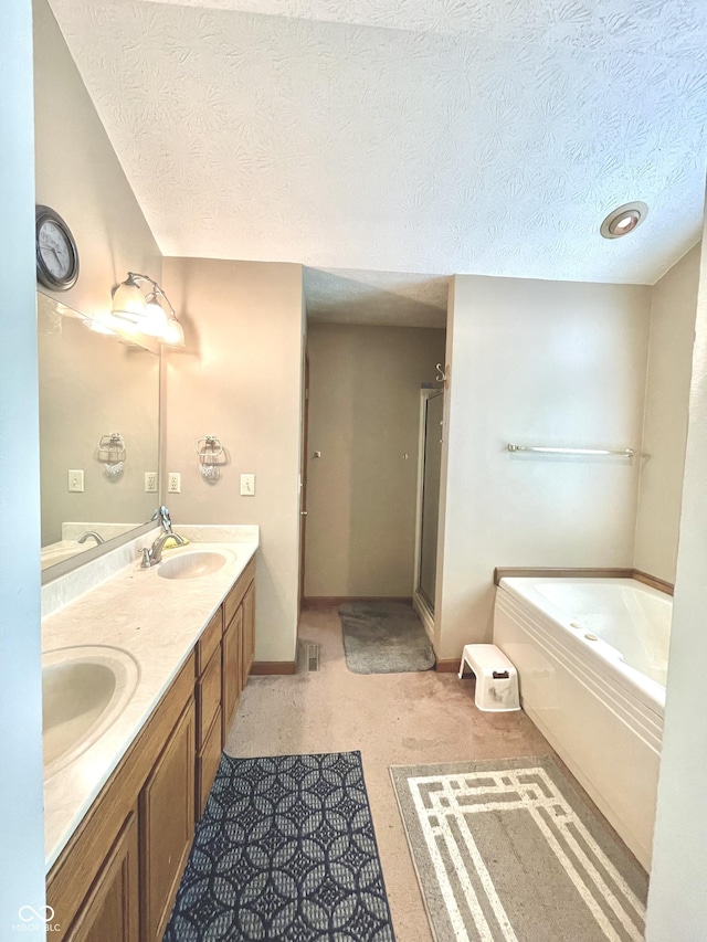 6396 Granny Smith Ln, Avon, IN 46123 - bathroom featuring a bath, double vanity, a textured ceiling, a shower with door, and baseboards