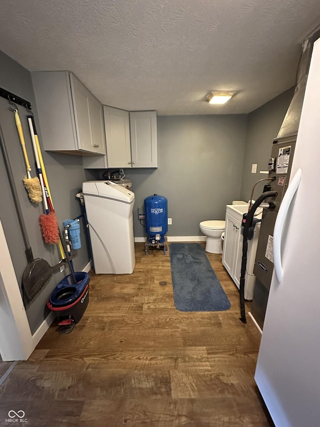 12967 N County Road 825 E, Roachdale, IN 46172 - washroom with wood finished floors, baseboards, and a textured ceiling