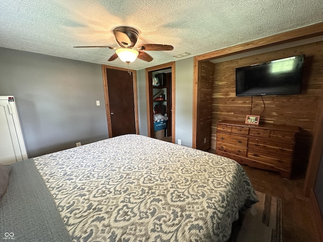 12967 N County Road 825 E, Roachdale, IN 46172 - bedroom with a textured ceiling and a ceiling fan