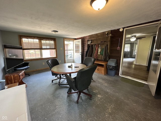 12967 N County Road 825 E, Roachdale, IN 46172 - dining area featuring baseboards, wood walls, and a textured ceiling