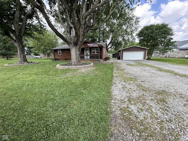 12967 N County Road 825 E, Roachdale, IN 46172 - view of front of property with a detached garage, covered porch, an outdoor structure, and a front lawn
