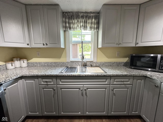 12967 N County Road 825 E, Roachdale, IN 46172 - kitchen featuring stainless steel microwave, a sink, and gray cabinetry