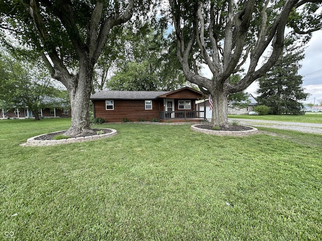 12967 N County Road 825 E, Roachdale, IN 46172 - ranch-style house with a porch and a front yard